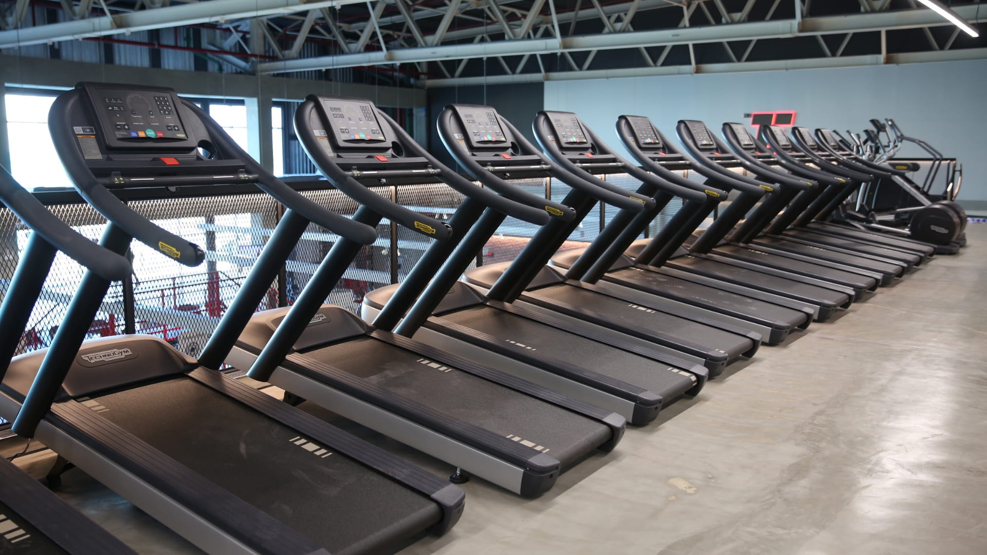 A view of treadmills in a Fitness First gym