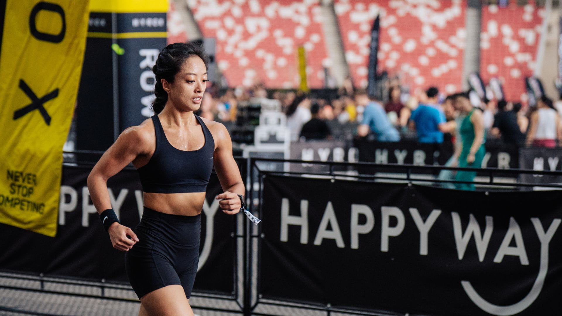 Woman athlete competing at HYROX